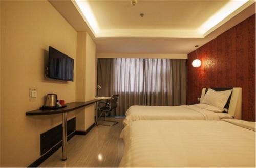 Imagen de la habitación del Hotel Fairyland Shanghai New International Exihibi. Foto 7