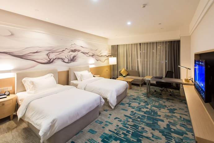 Imagen de la habitación del Hotel Faithland Atin Apartment. Foto 4