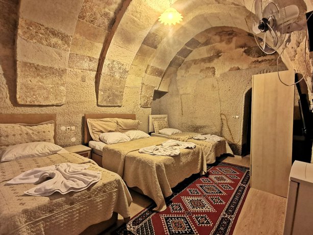 Imagen de la habitación del Hotel Falcon Cave Suites. Foto 4