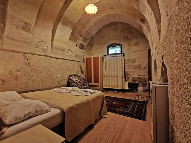 Imagen de la habitación del Hotel Falcon Cave Suites. Foto 10