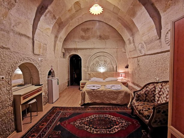 Imagen de la habitación del Hotel Falcon Cave Suites. Foto 11