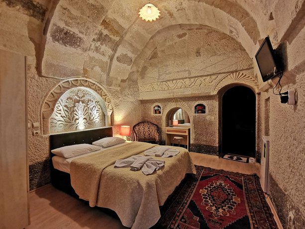 Imagen de la habitación del Hotel Falcon Cave Suites. Foto 13