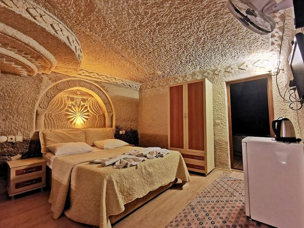 Imagen de la habitación del Hotel Falcon Cave Suites. Foto 14