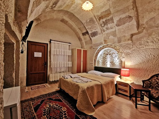 Imagen de la habitación del Hotel Falcon Cave Suites. Foto 15