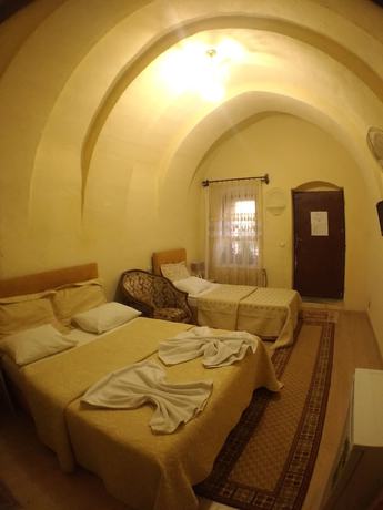 Imagen de la habitación del Hotel Falcon Cave Suites. Foto 17