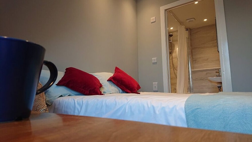 Imagen de la habitación del Hotel Falcon Crest Guest House. Foto 5