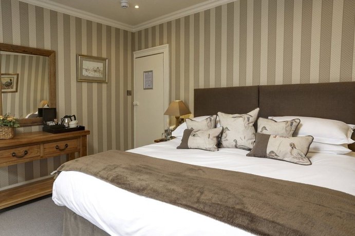Imagen de la habitación del Hotel Falcon Manor. Foto 5