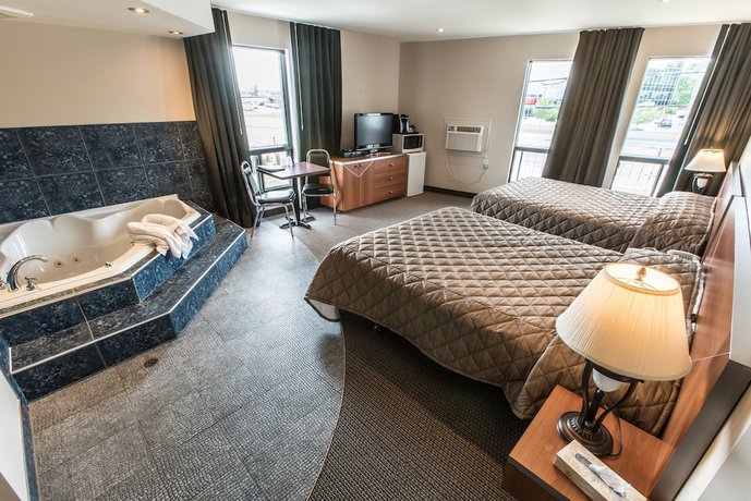 Imagen de la habitación del Hotel Falcon Motel Brossard. Foto 4