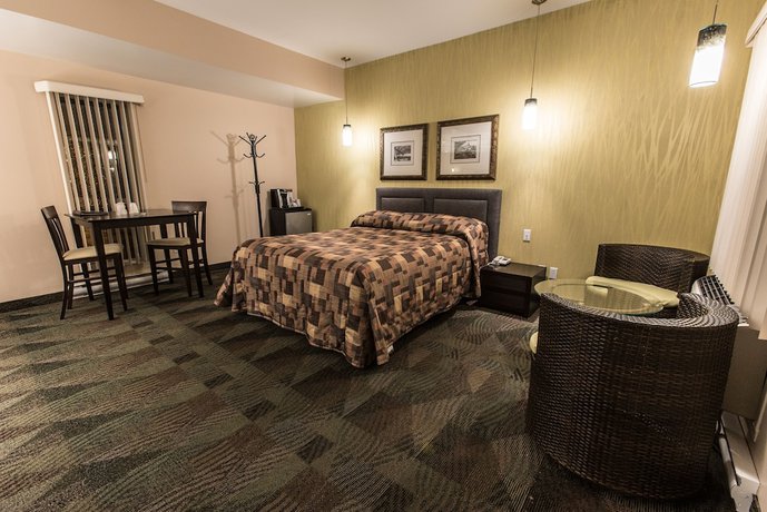 Imagen de la habitación del Hotel Falcon Motel Brossard. Foto 10