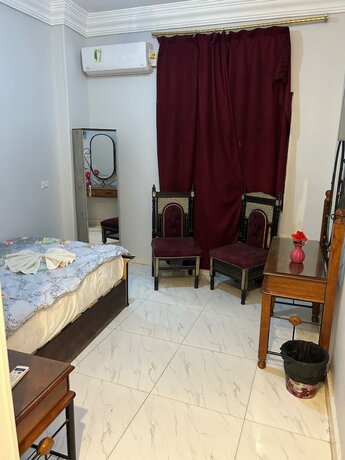 Imagen de la habitación del Hotel Falcon pyramids inn. Foto 18