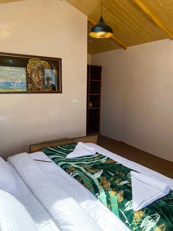Imagen de los interiores del Hotel Falcon\'S Cottages. Foto 14