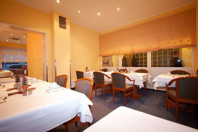 Imagen del bar/restaurante del Hotel Falk Hotel. Foto 2