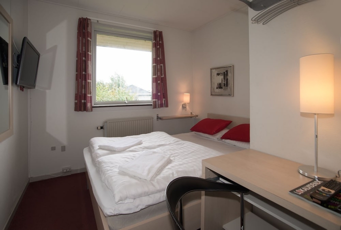 Imagen de la habitación del Hotel Falken. Foto 7