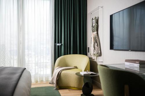 Imagen de la habitación del Hotel Falkensteiner Bozen WaltherPark. Foto 11