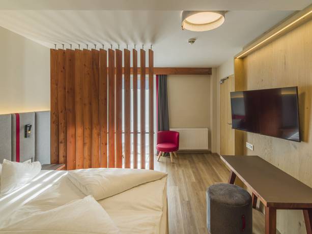 Imagen de la habitación del Hotel Falkensteiner Family Sonnenalpe. Foto 3