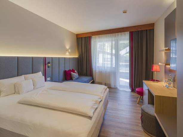 Imagen de la habitación del Hotel Falkensteiner Family Sonnenalpe. Foto 5