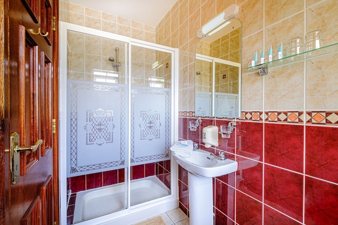 Imagen de la habitación del Hotel Fallons Bed and Breakfast. Foto 15
