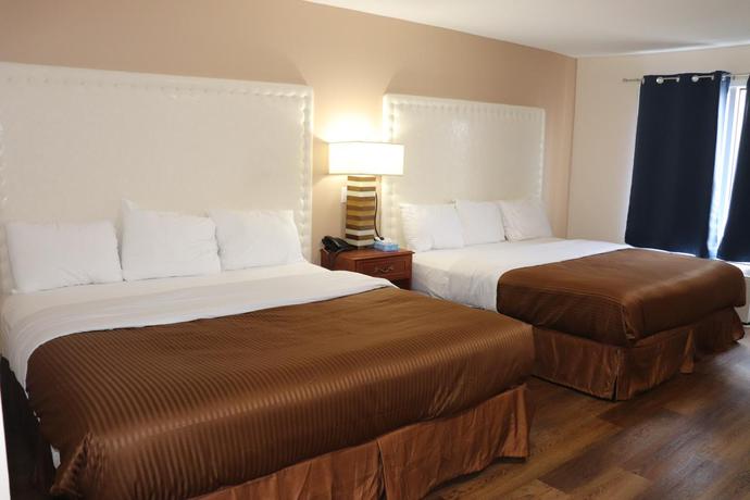 Imagen de la habitación del Hotel Falls Lodge and Suites. Foto 3