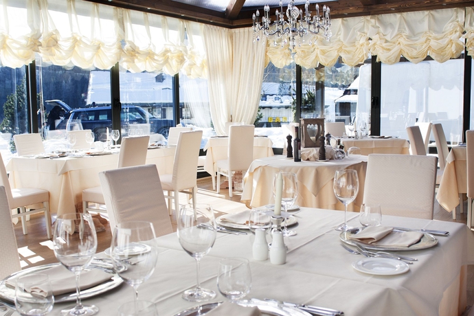 Imagen del bar/restaurante del Hotel Faloria Mountain Spa Resort. Foto 3