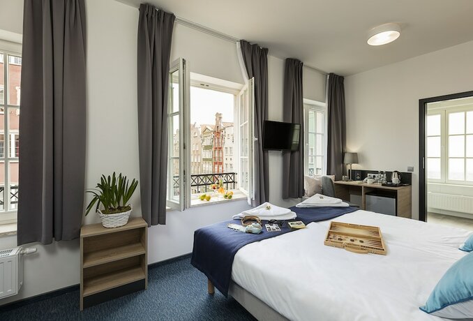 Imagen de la habitación del Hotel Fama Residence. Foto 20