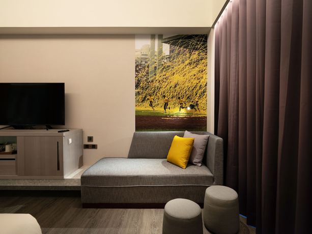 Imagen de la habitación del Hotel Fame Hall Garden Hotel. Foto 10
