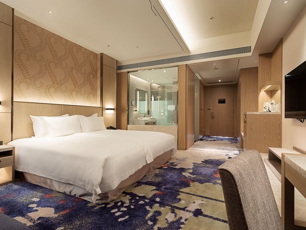 Imagen de la habitación del Hotel Fame Hall Garden Hotel. Foto 15