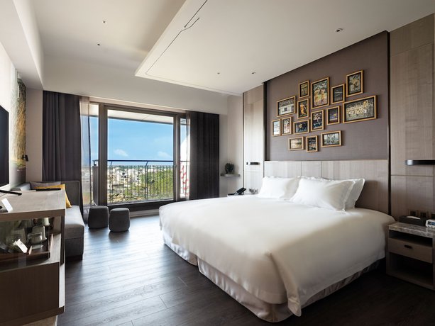 Imagen de la habitación del Hotel Fame Hall Garden Hotel. Foto 19