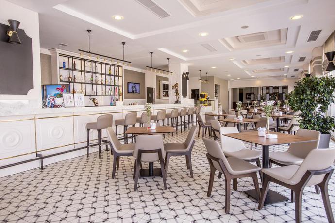 Imagen del bar/restaurante del Hotel Fame Residence Kemer and Spa - All Inclusive. Foto 8