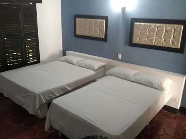 Imagen de la habitación del Hotel Familia Casa Blanca. Foto 7