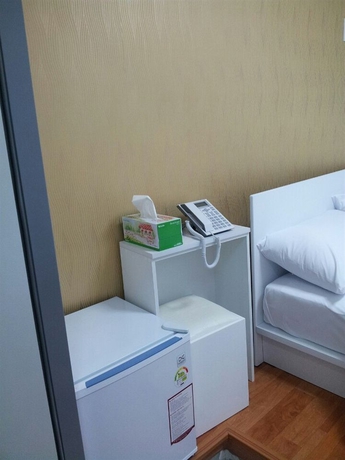 Imagen de la habitación del Hotel Familia INN. Foto 6