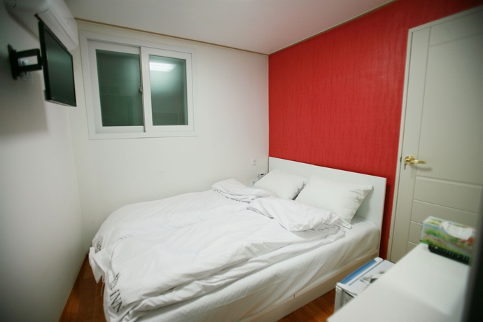 Imagen de la habitación del Hotel Familia INN. Foto 10