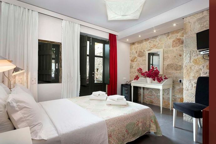 Imagen de la habitación del Hotel Familia, &Iacute;taca. Foto 7