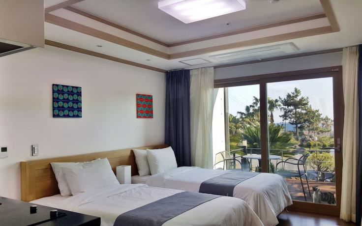 Imagen de la habitación del Hotel Familia Jeju. Foto 7