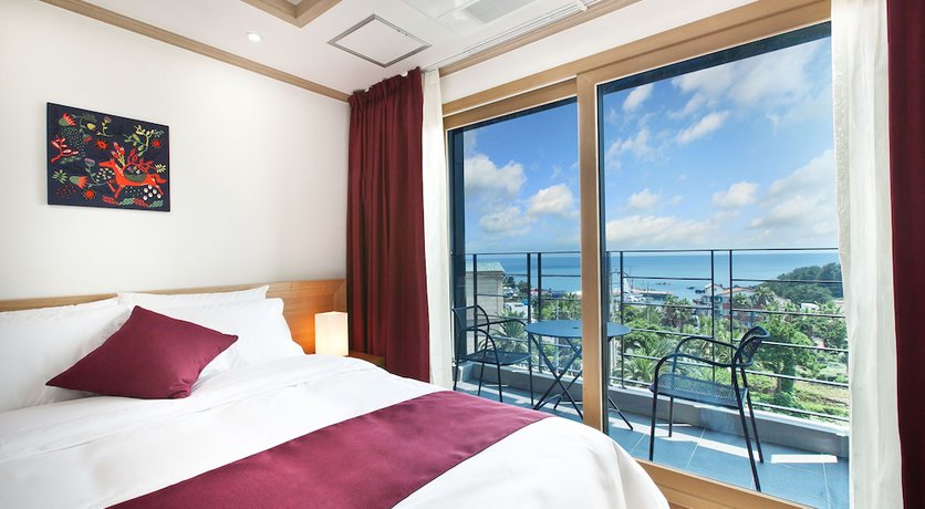 Imagen de la habitación del Hotel Familia Jeju. Foto 16