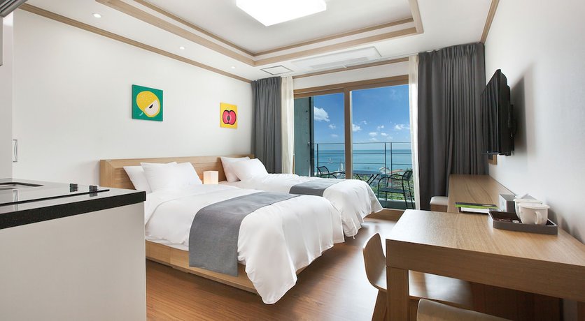 Imagen de la habitación del Hotel Familia Jeju. Foto 18