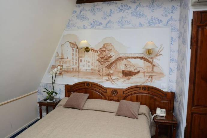 Imagen de la habitación del Hotel Familia, París. Foto 2