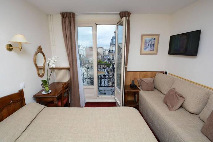 Imagen de la habitación del Hotel Familia, París. Foto 5