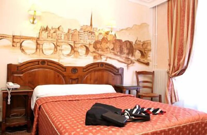 Imagen de la habitación del Hotel Familia, París. Foto 14