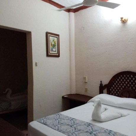 Imagen de la habitación del Hotel Familiar El Dorado. Foto 11