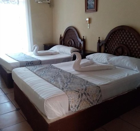 Imagen de la habitación del Hotel Familiar El Dorado. Foto 14