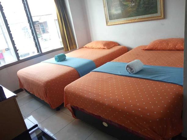Imagen de la habitación del Hotel Familie Ayu Garut. Foto 11