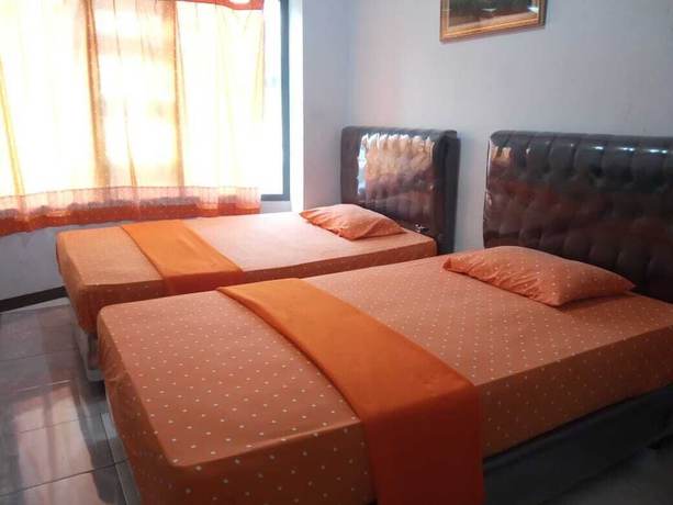 Imagen de la habitación del Hotel Familie Ayu Garut. Foto 14