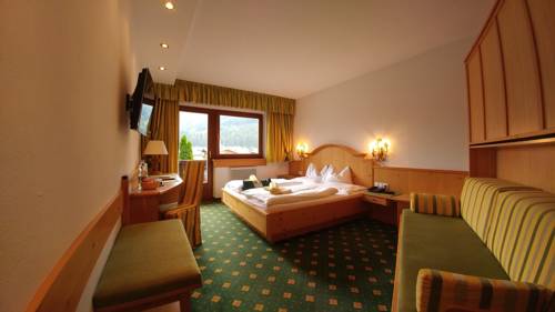 Imagen de la habitación del Hotel Familien and Vitalhotel Auenhof. Foto 8