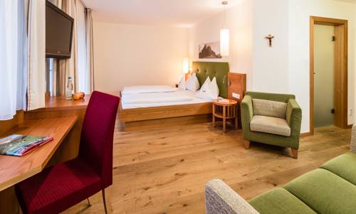 Imagen de la habitación del Hotel Familienhotel Huber. Foto 2