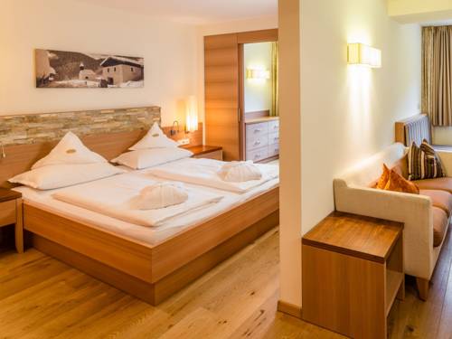 Imagen de la habitación del Hotel Familienhotel Huber. Foto 5