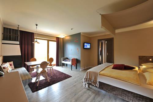 Imagen de la habitación del Hotel Familienresort Ellmauhof - Das Feriengut. Foto 8