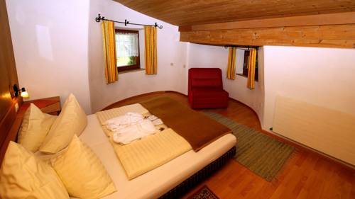 Imagen de la habitación del Hotel Familienresort Ellmauhof - Das Feriengut. Foto 10