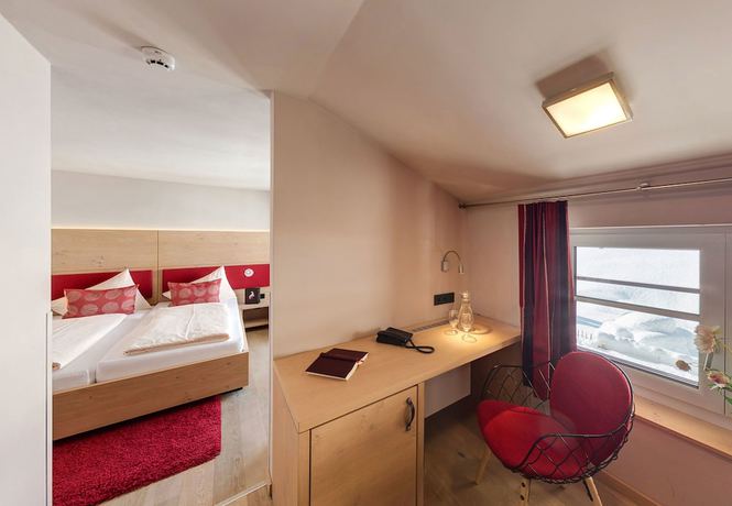 Imagen de la habitación del Hotel Familotel Alphotel. Foto 11