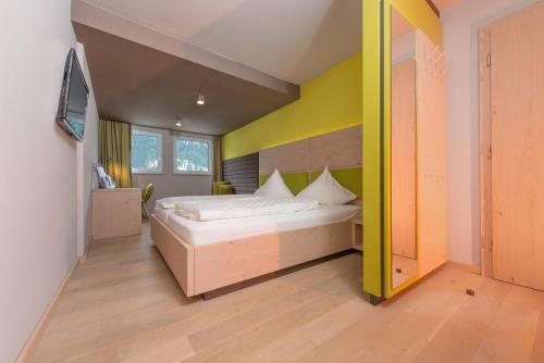 Imagen de la habitación del Hotel Familotel Alphotel. Foto 12