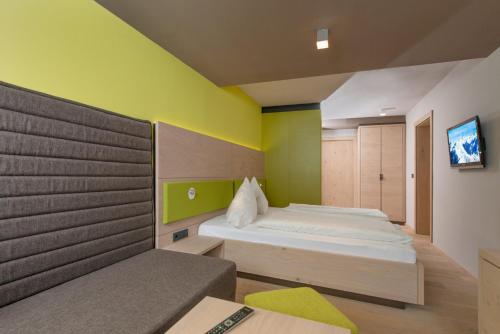 Imagen de la habitación del Hotel Familotel Alphotel. Foto 13